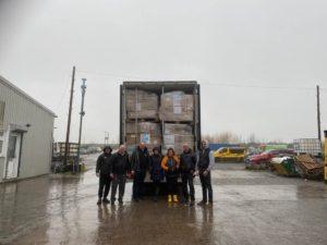 Ukraine Aid lorry with helpers
